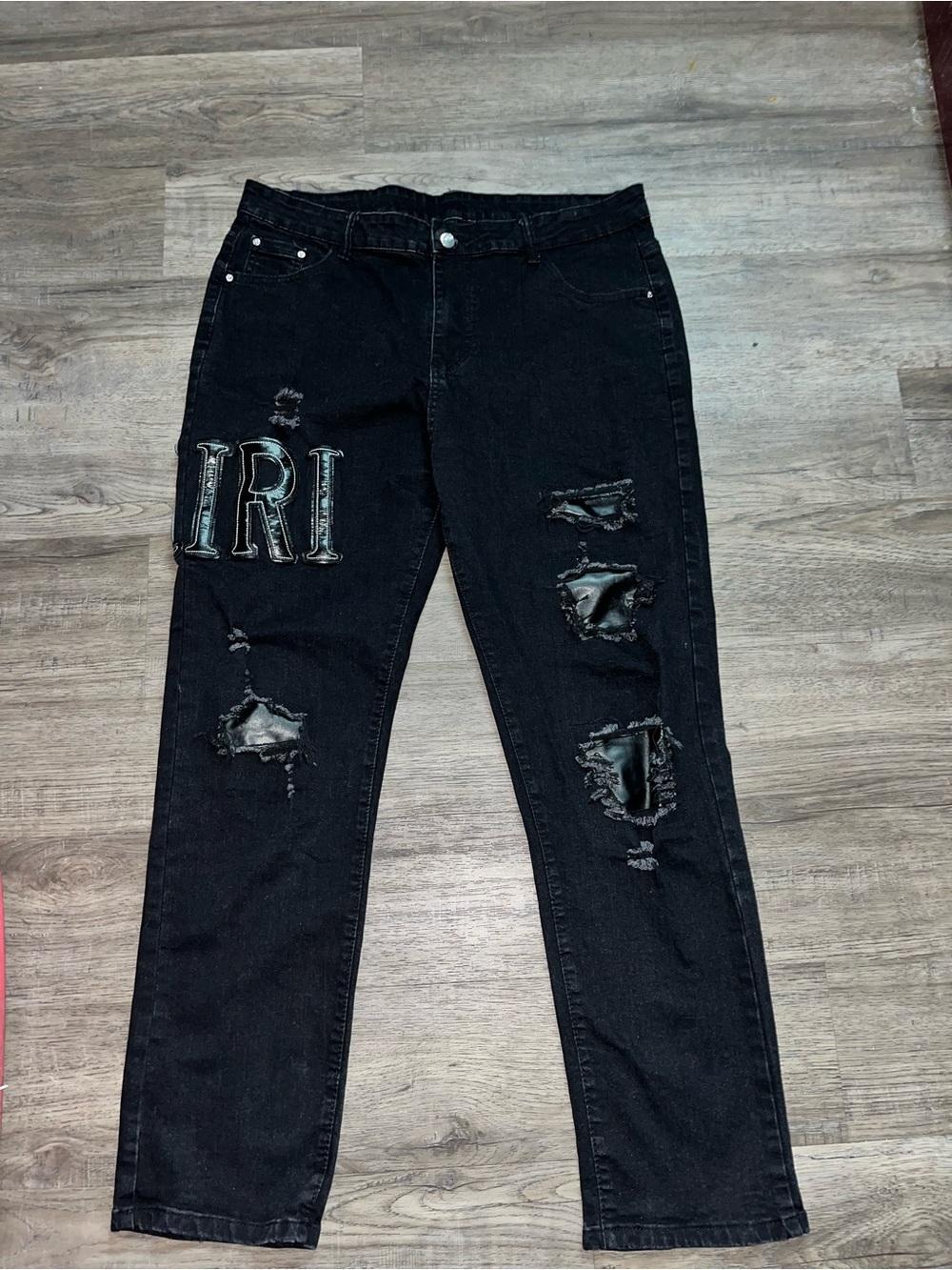 AMIRI Black Distressed Boyfriend Jeans with Embroidered Patch